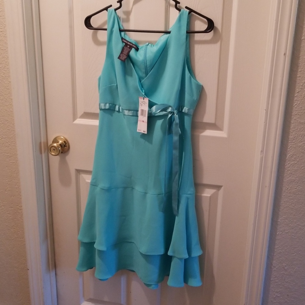 Jones wear teal dress. NEW